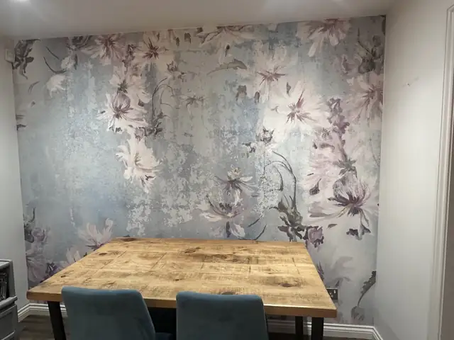 Floral wallpaper feature wall in a dining area